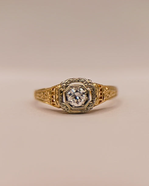 Detailed Gold and Diamond Ring