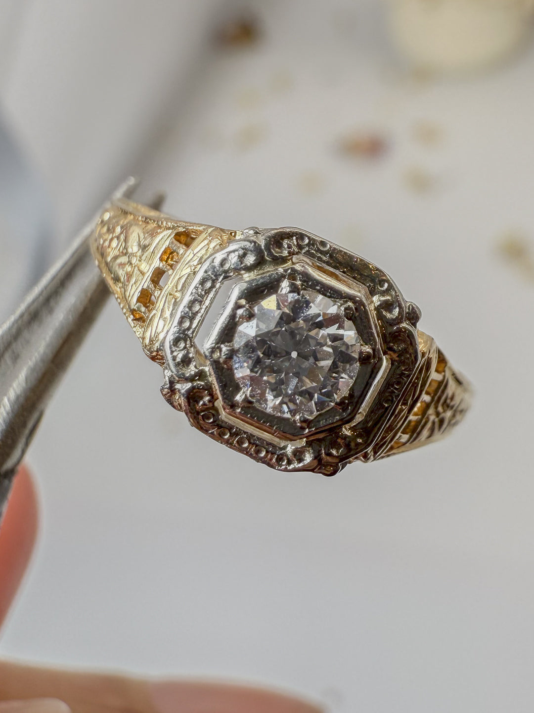 Detailed Gold and Diamond Ring
